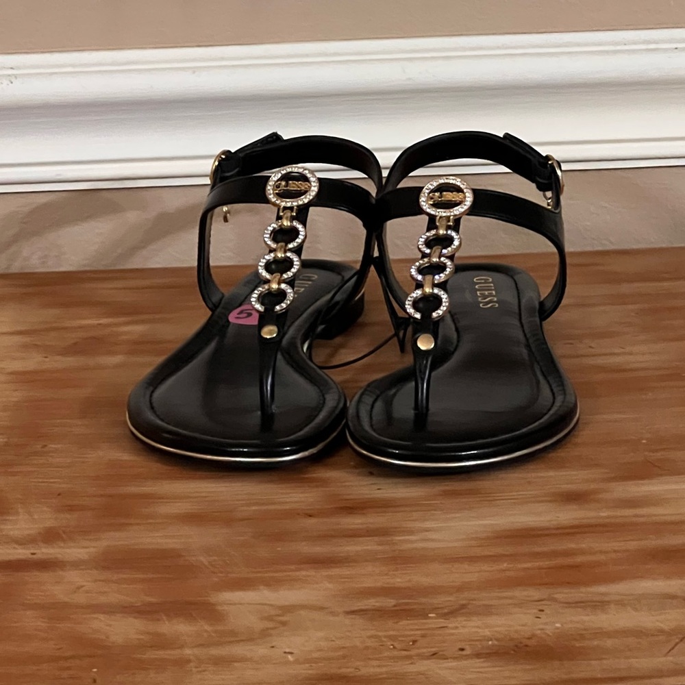 Beautiful sandals color black with gold new without tag size #5 beautiful style